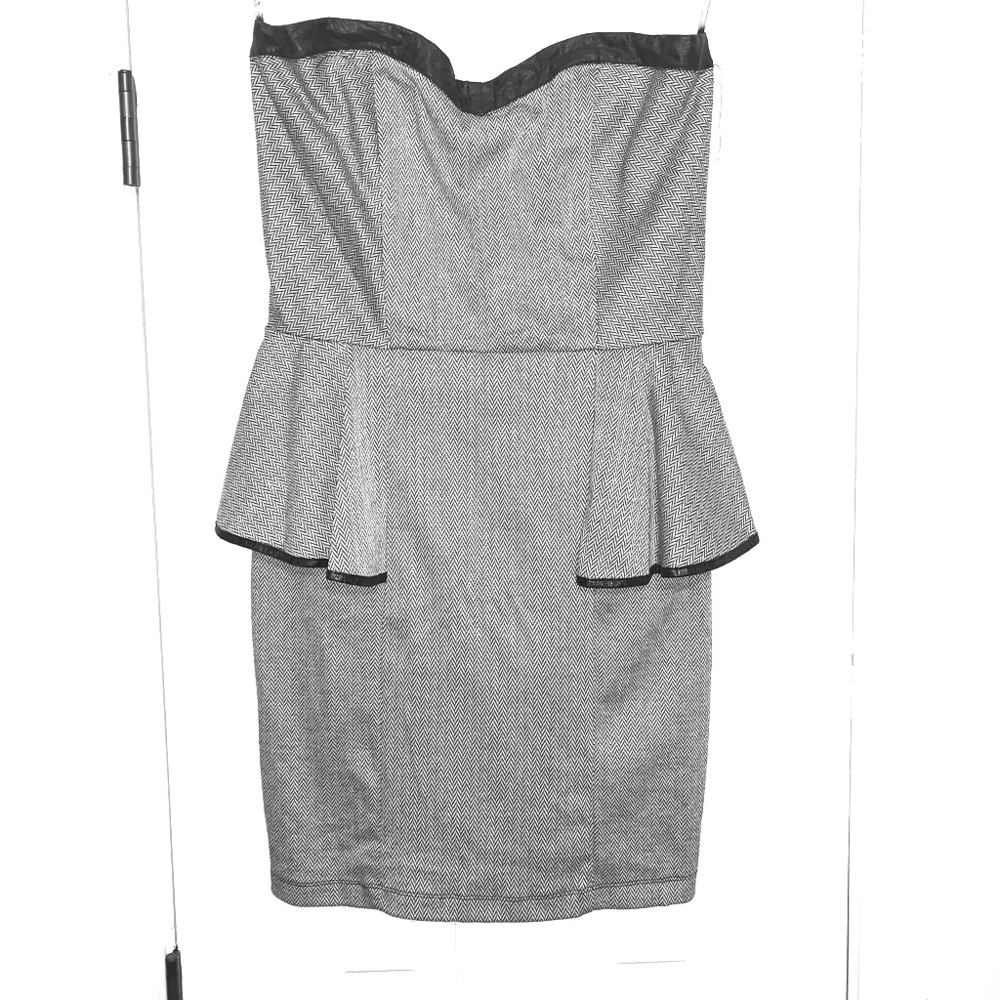 Strapless Black and White peplum dress.